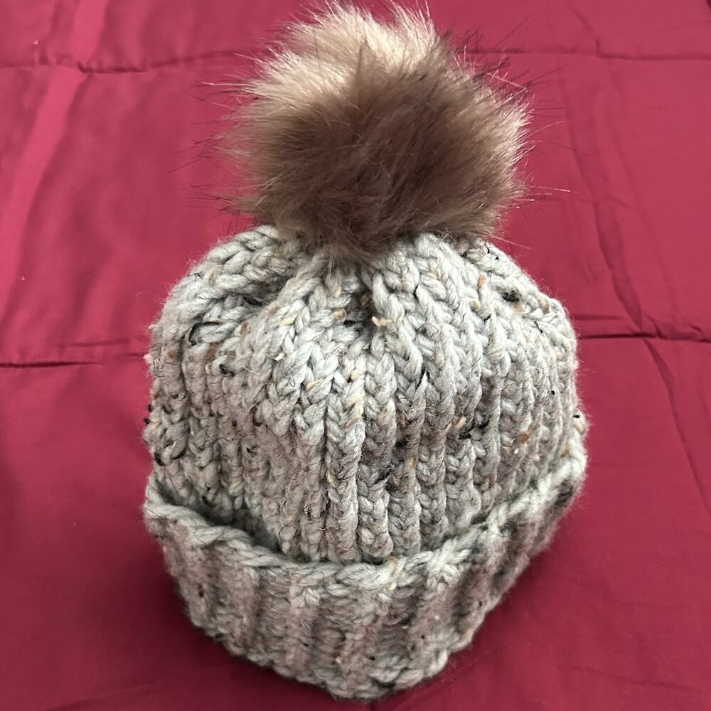 Hand-knit pom hat